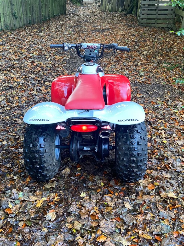 Honda trx 125 quad big red 