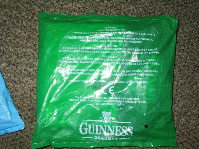 New Guinness Draught Branded Item in Green Plastic Bag