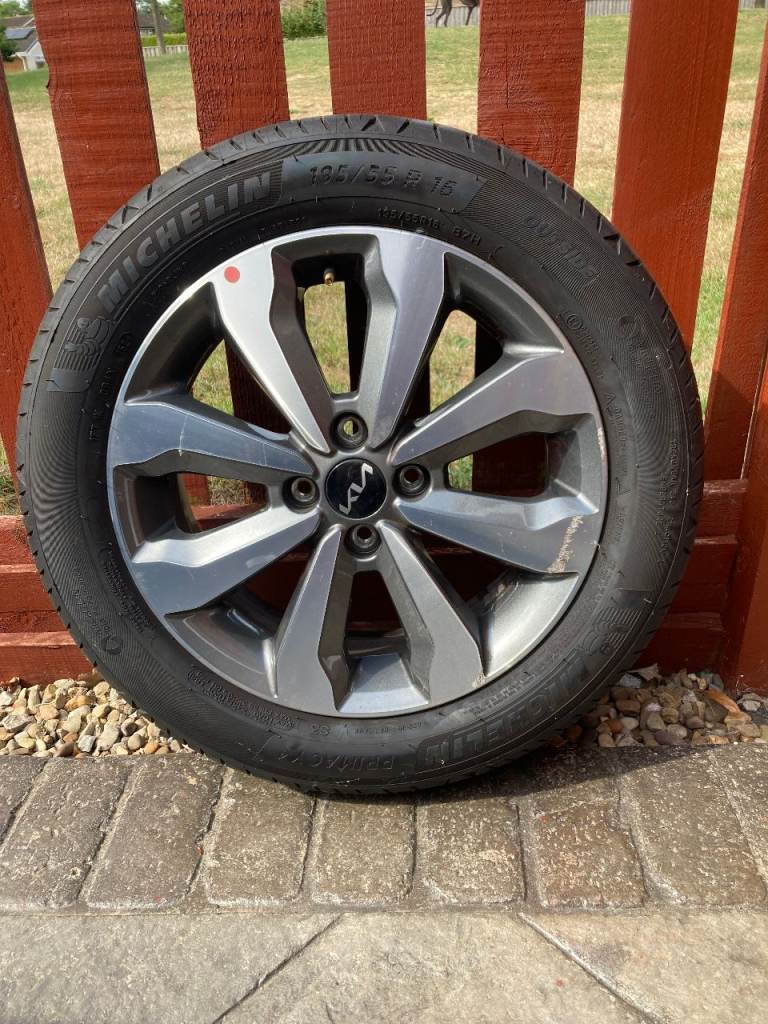 4 studded wheel rim and tyre ( Michelin )