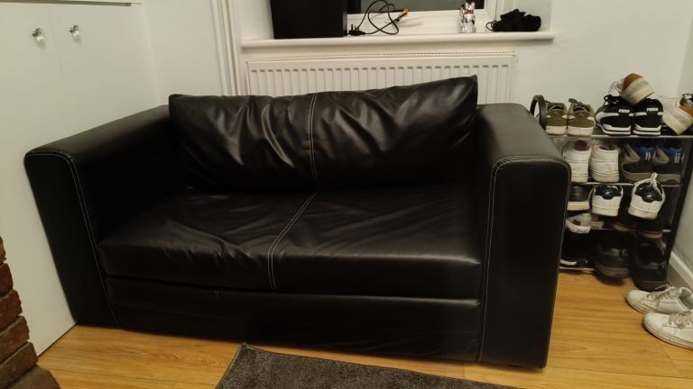 IKEA 2-Seater Sofa Bed – Black – Good Condition (Needs minor repair)