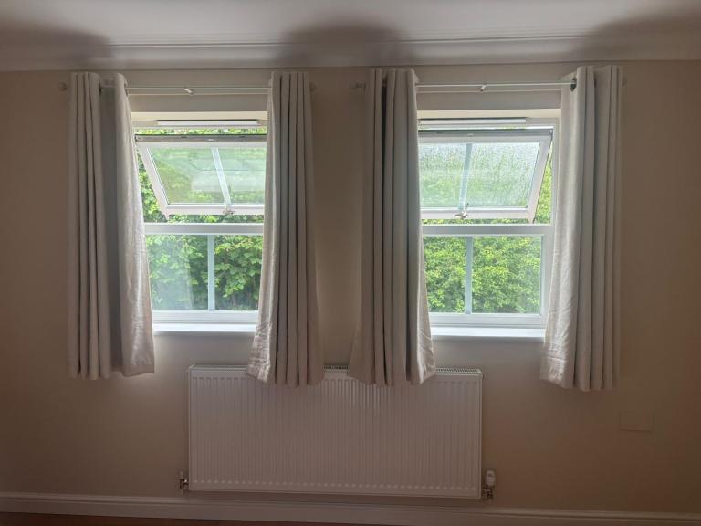 Pair of Beige Eyelet Curtains – Good Condition