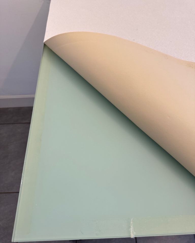 Glass topped dining table