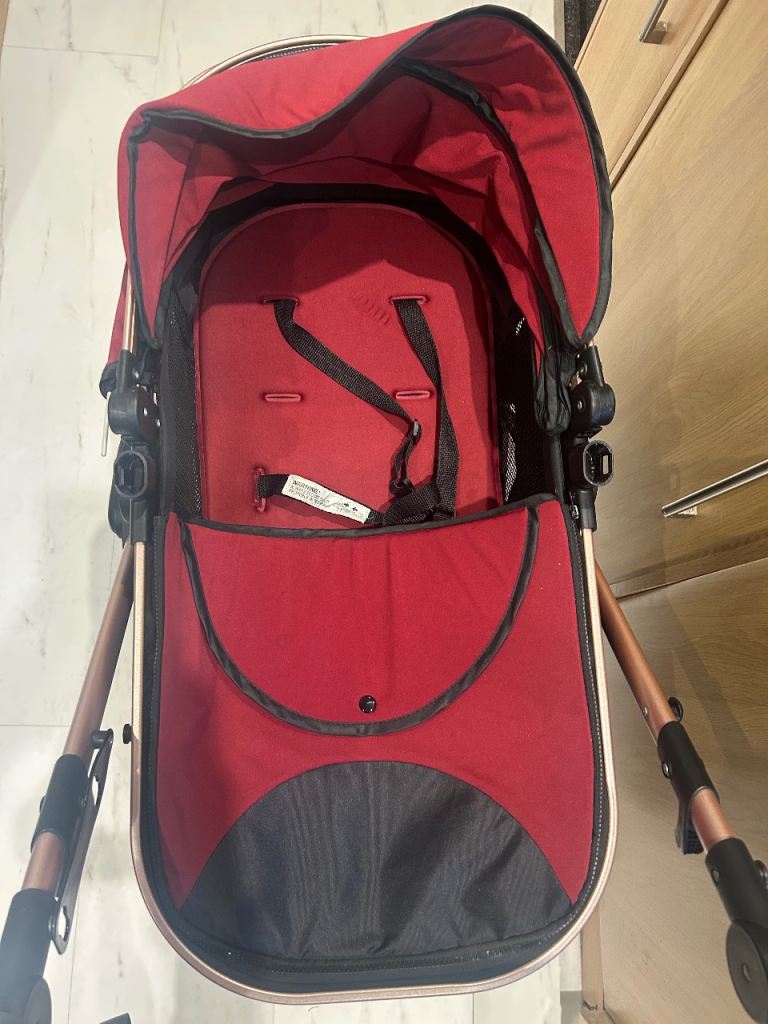 Dark red buggy/ stroller