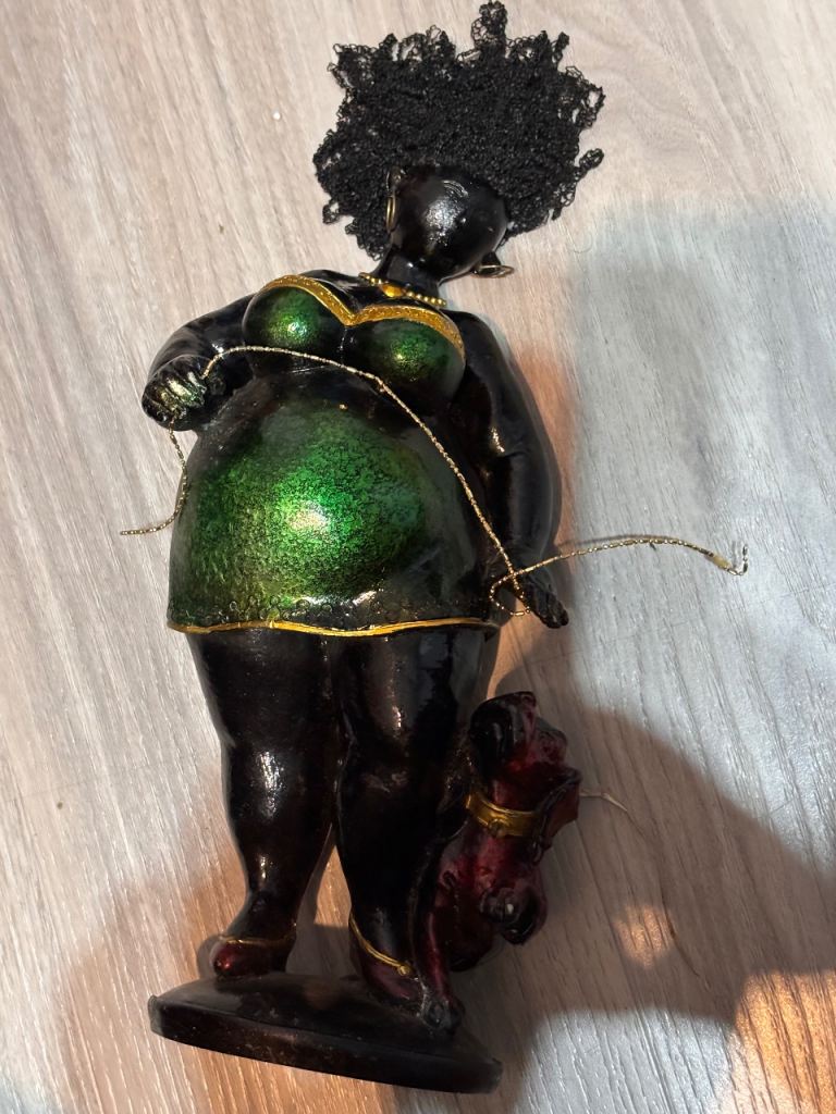 African tribal lady figurine statue designed for home decor.