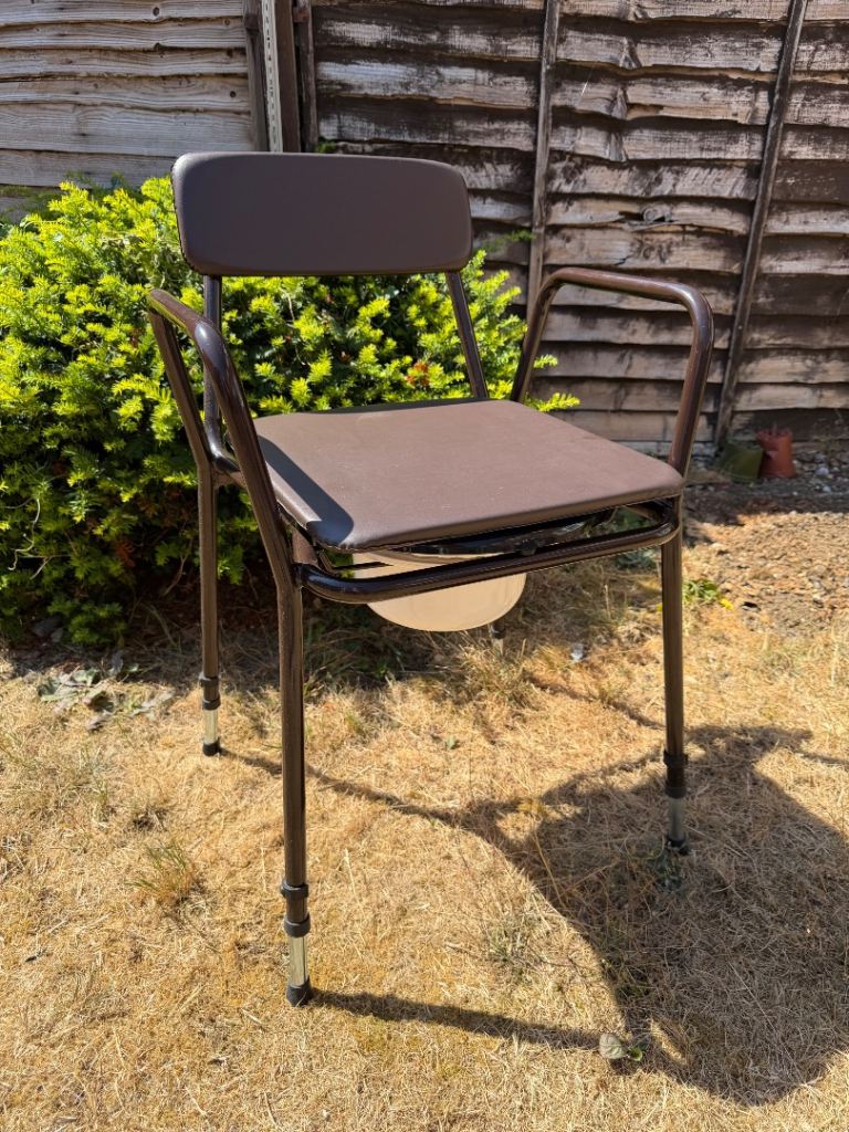 Adjustable Commode Chair with Lid – Good Condition