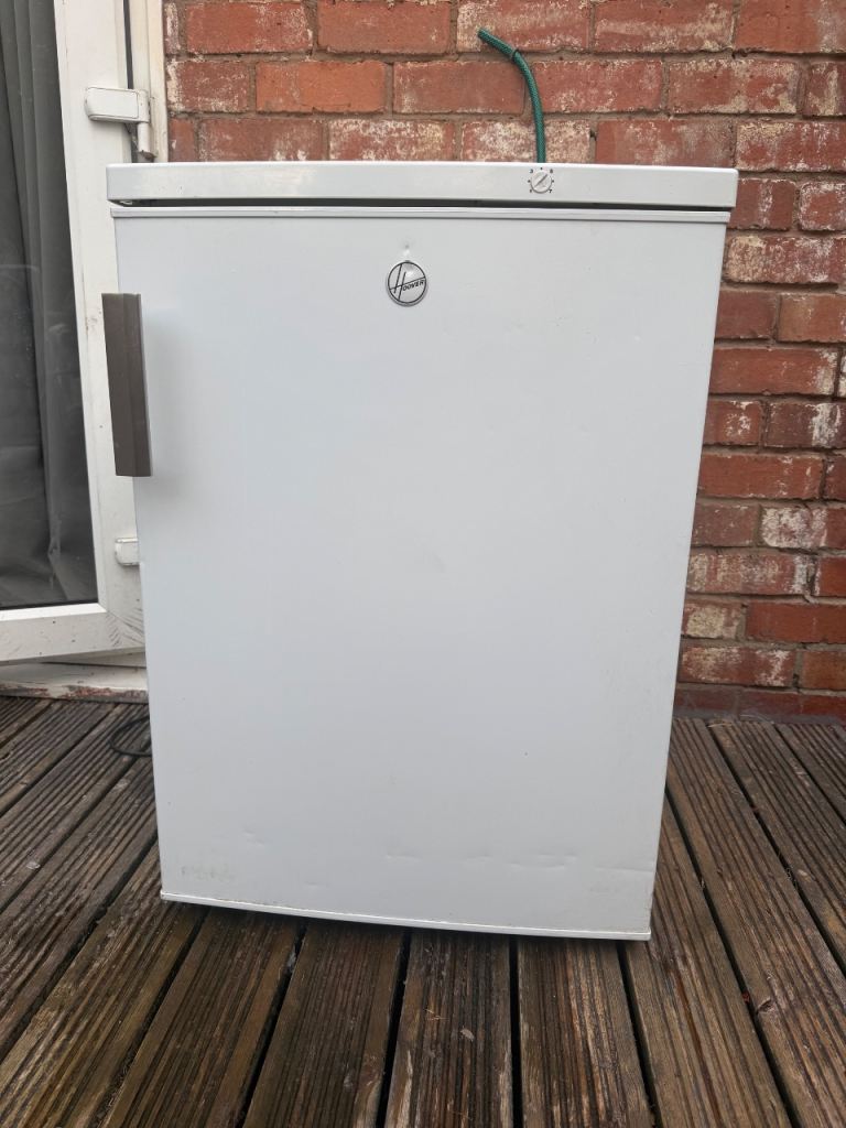 White Freezer all the doors are slightly coming off but aside from that it works fine collection 