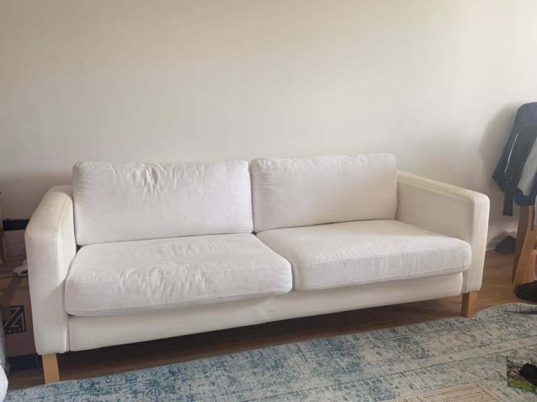 Comfortable White Two-Seater Sofa – Good Condition