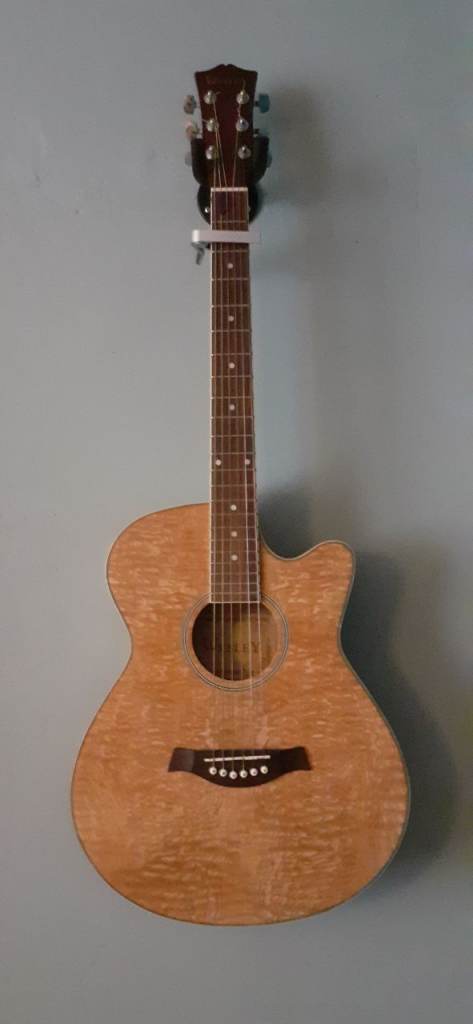 Acoustic Guitar with Capo – Natural Wood Finish