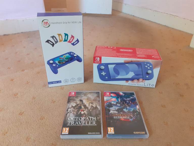 NINTENDO SWITCH LITE - BLUE, BOXED, WITH HANDHELD GRIP AND 2 GAMES. AS NEW / HARDLY USED