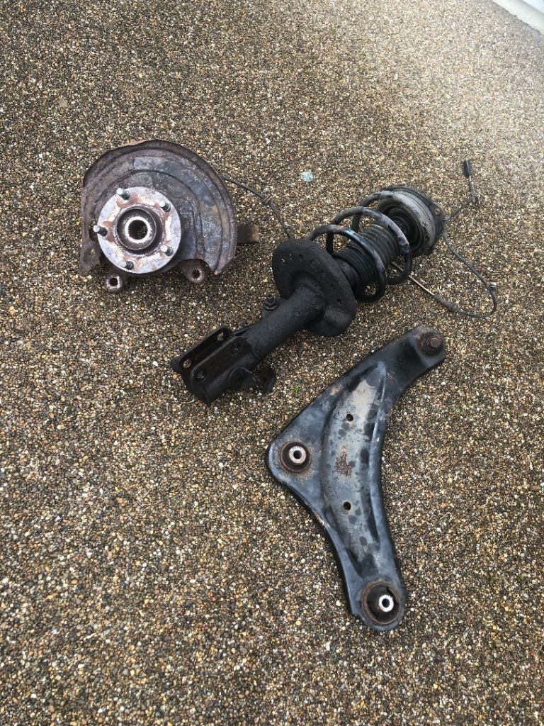 Nissan leaf o/s driver side suspension, including shock absorber, spring, lower arm, abs and hub