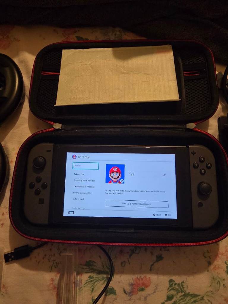 Nintendo switch console with accessories/ charging dock & more/mint condition