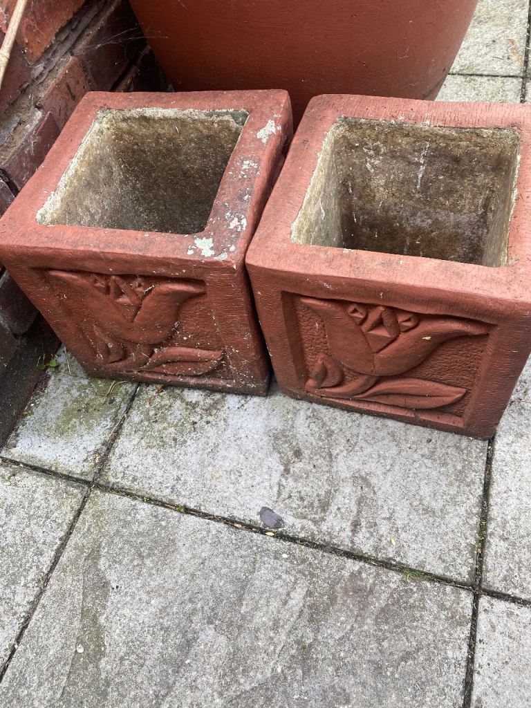 FREE Pair of Square Garden Planters with tulip design on all sides.