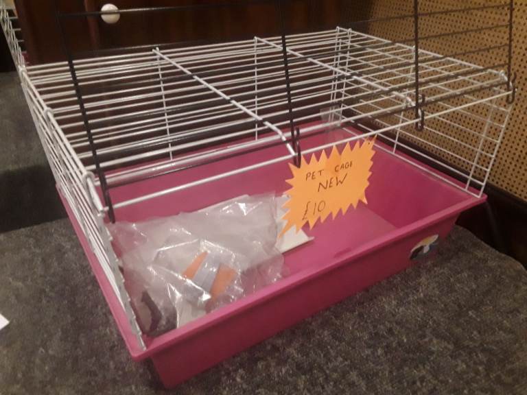PET CAGE, NEW.  COMES WITH WATER BOTTLE AND FEEDER 