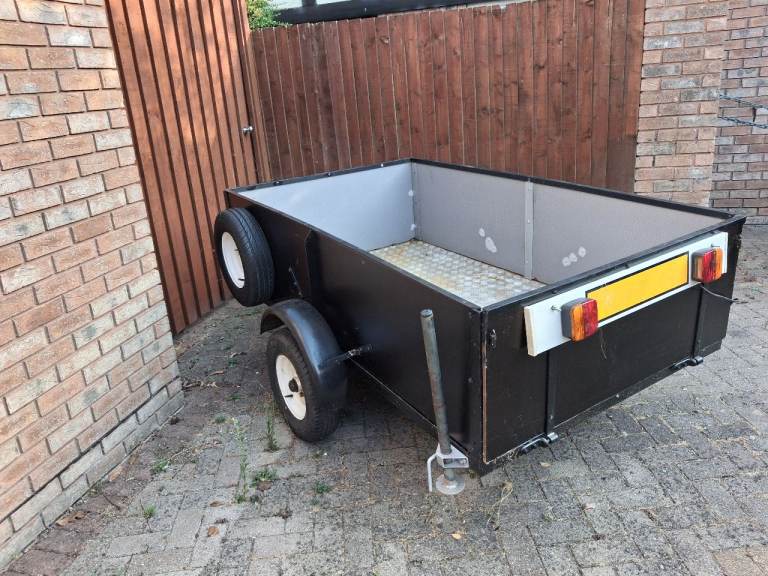 Small Black Trailer with Spare Wheel – Good Condition