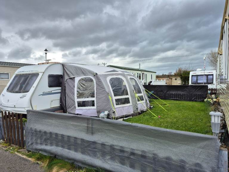Caravan seasonal pitch with fenced garden 