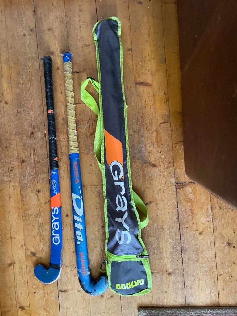 Three junior hockey sticks