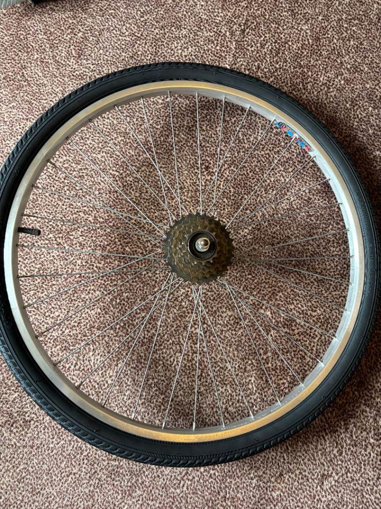 2 SHIMANO RIGIDA WHEELS AND BRAND NEW TYRES AND TUBES 26X175 £60