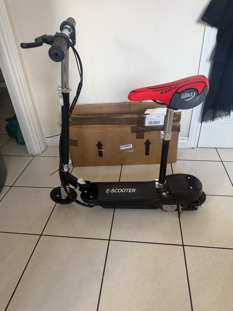 Electric scooter.  Brand new box.  Only £80