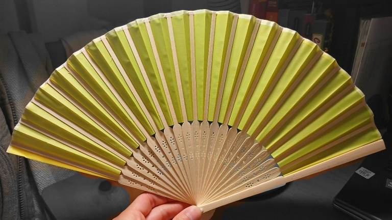 Handheld folding fan