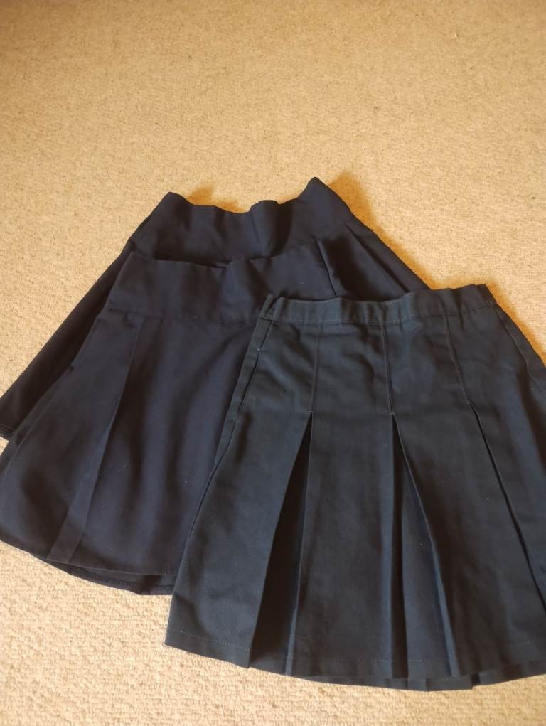 Girls Navy school skirts age 6-7 years