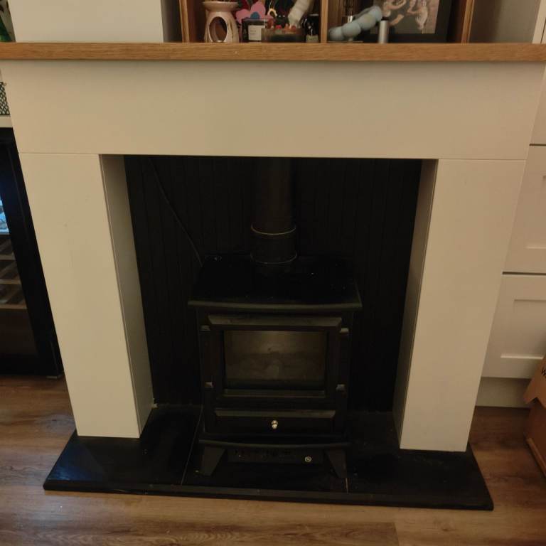 Electric fire stove and surround