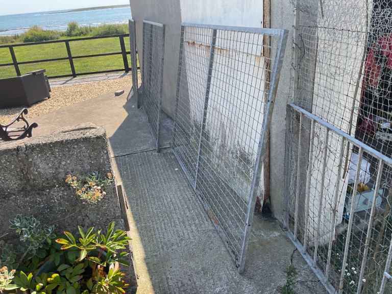 Three galvanised dog run panels