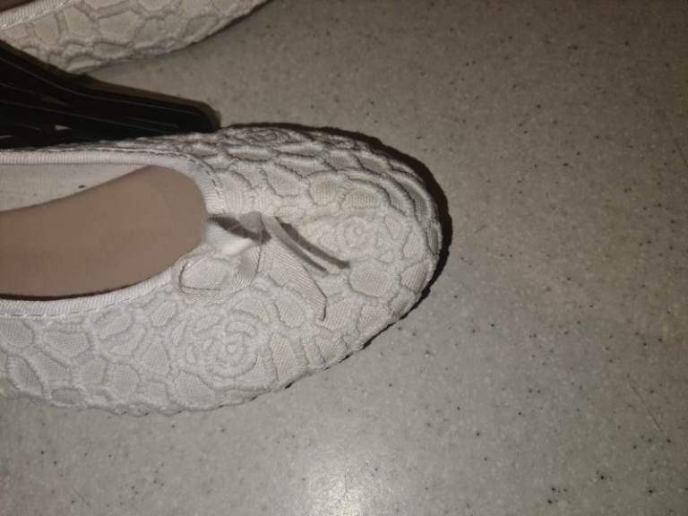Brand new white ballerinas/ flats with decorative patterns. Uk7