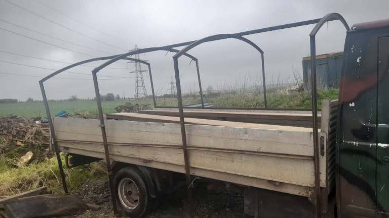 Miltery Tarpaulin cover and steal frame 