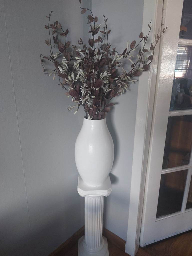 Large White Pedestal with Vase and Flowers with lights. Pedestal 24".  Vase on its own 18"