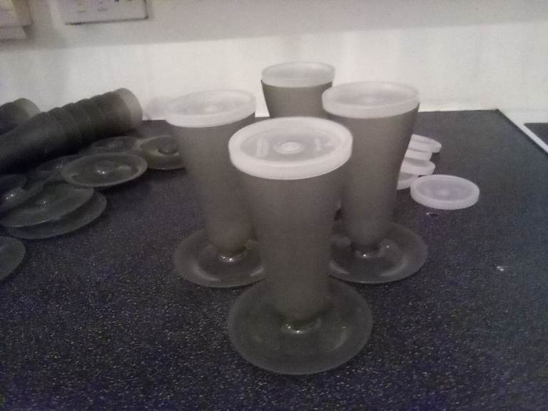 Vintage but unused Tupperware sundae/desert dishes.