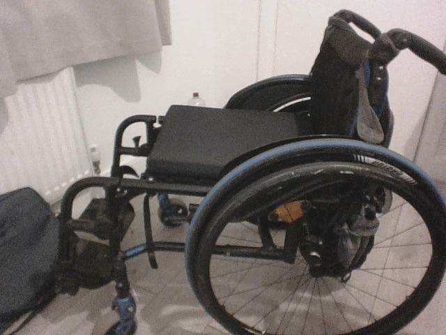 neon 2 blue and black wheel chair 
