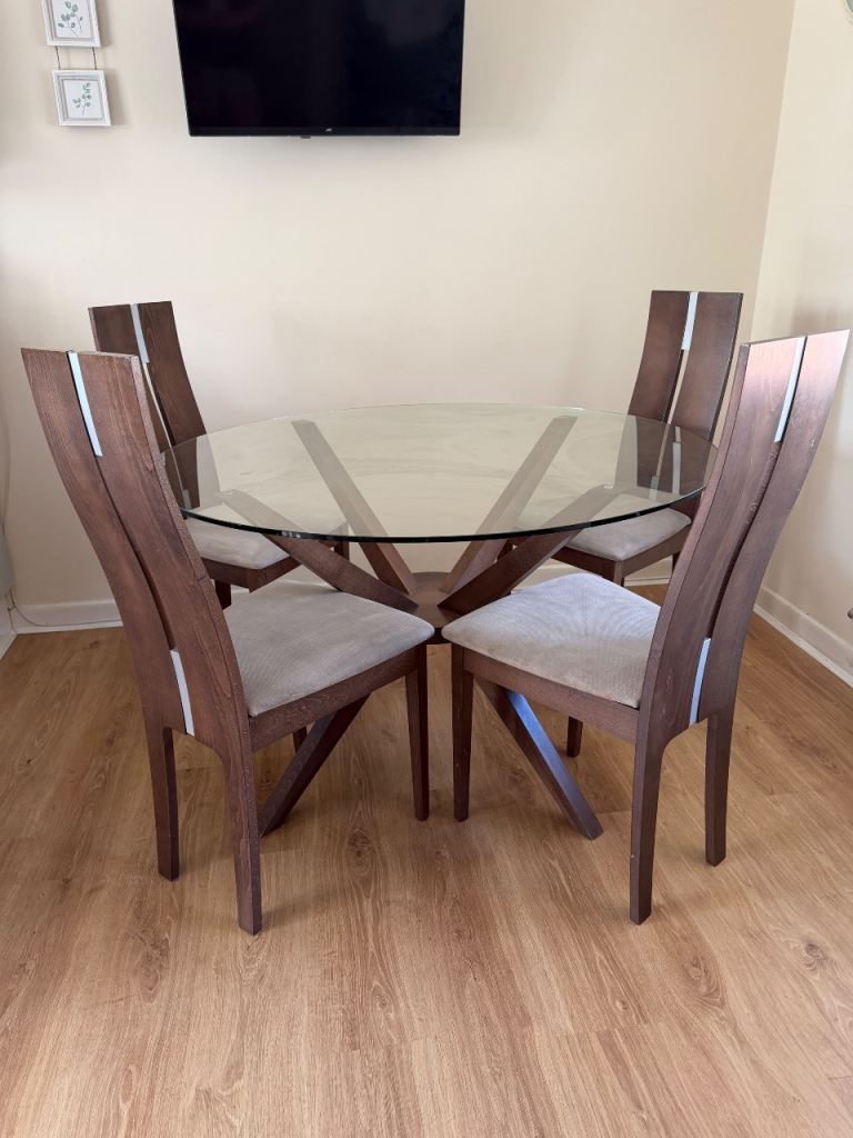 Glass Top Dining Table with 4 Wooden Chairs – Good Condition