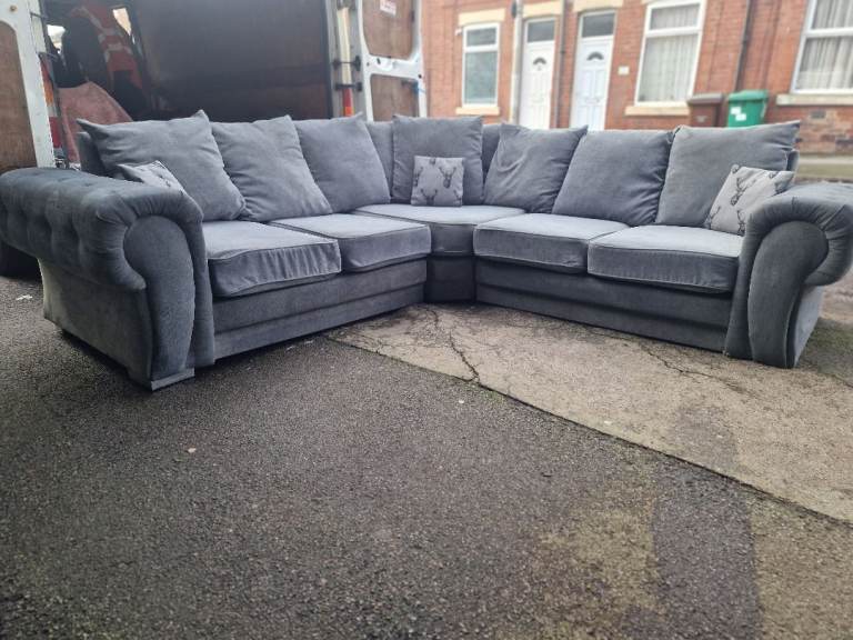 GREY CORNER SOFA IN GOOD CONDITION. NO COST DELIVERY 
