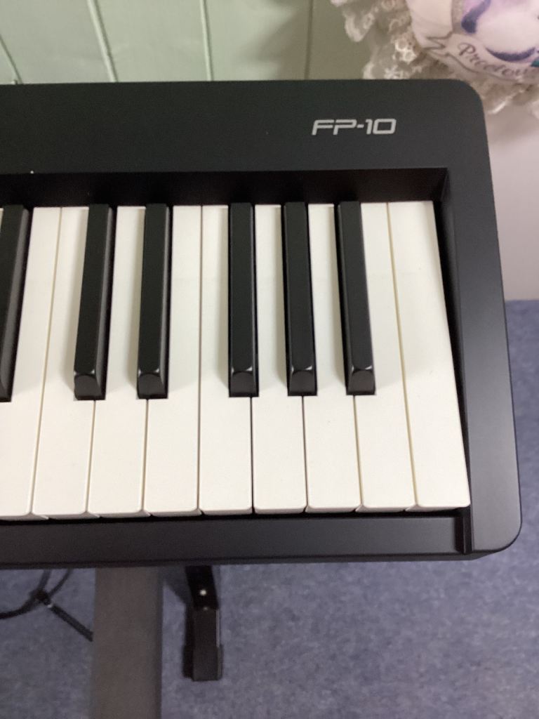 Roland FP10 digital piano with stand and stool
