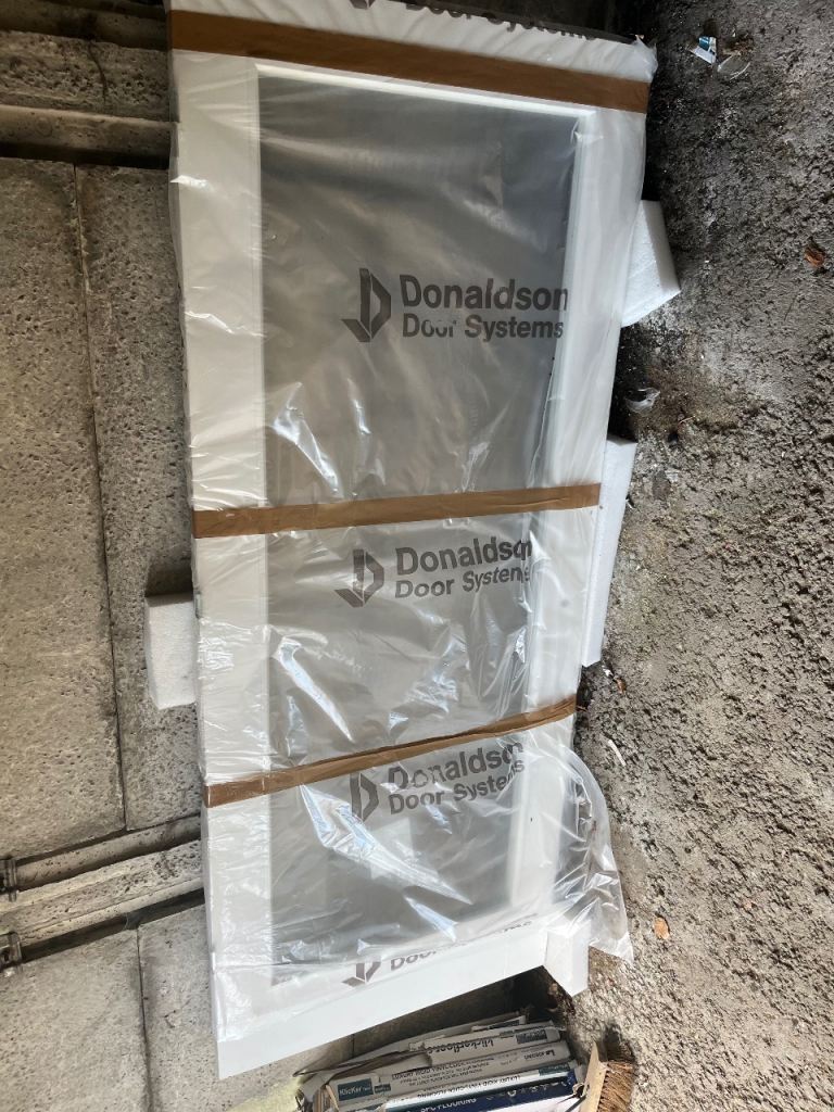 New Donaldson glazed solid core door
