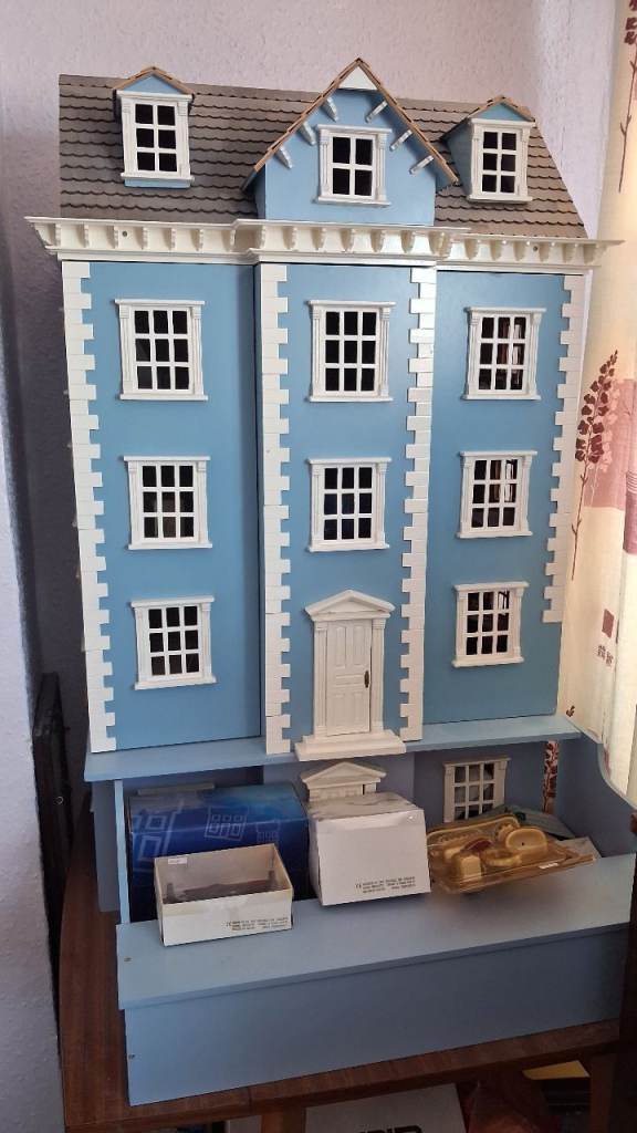 Large Blue Wooden Dolls House with Unassembled Furniture