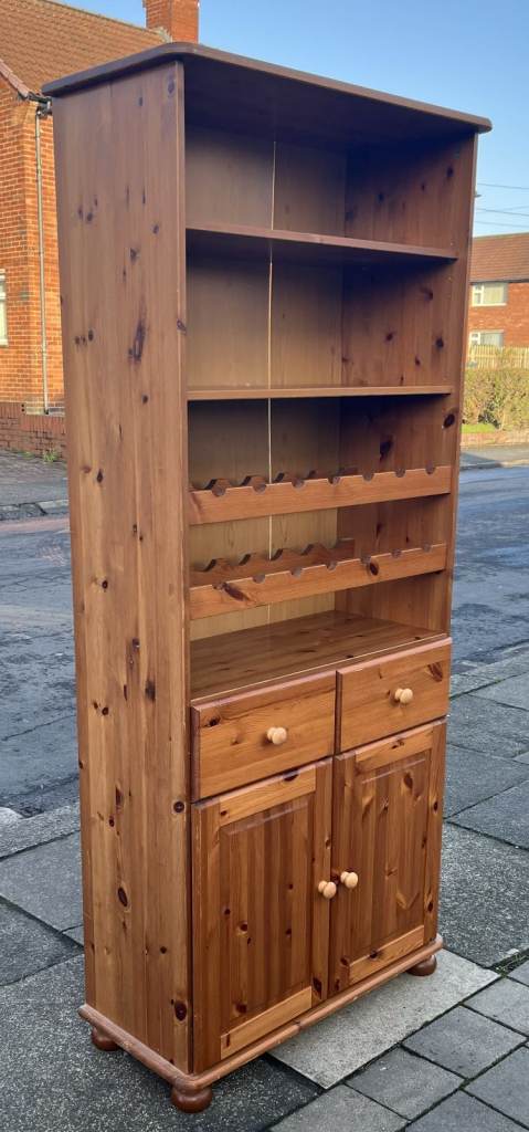 A SOLID PINE DRINKS DRESSER