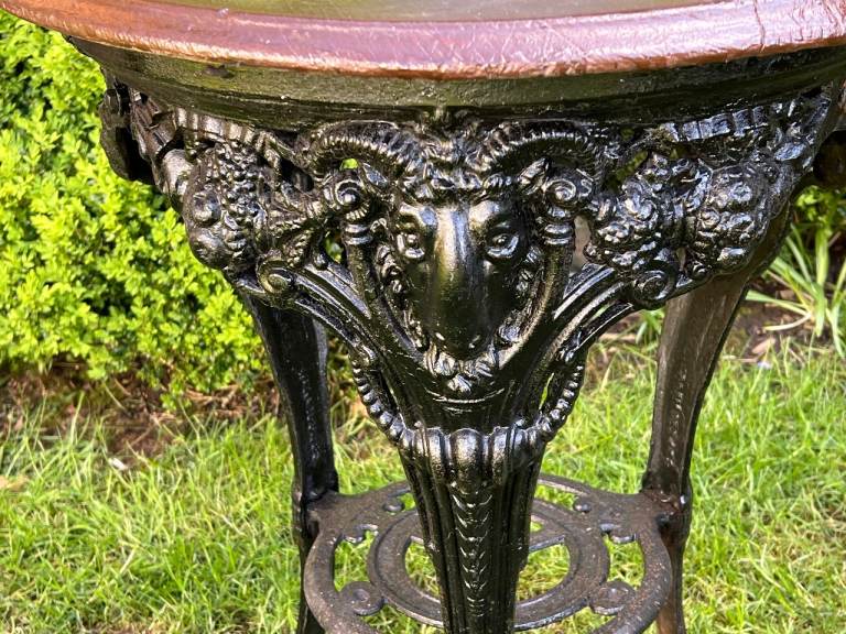 Cast iron ram's head design pub table