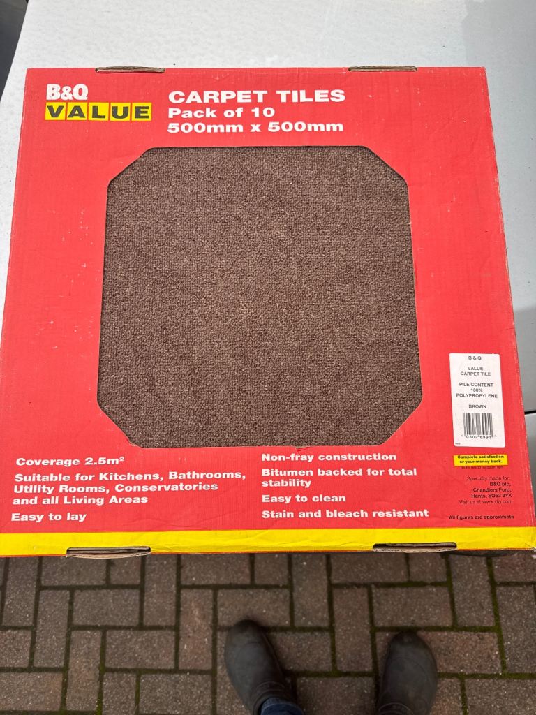 Brown carpet tiles, never laid