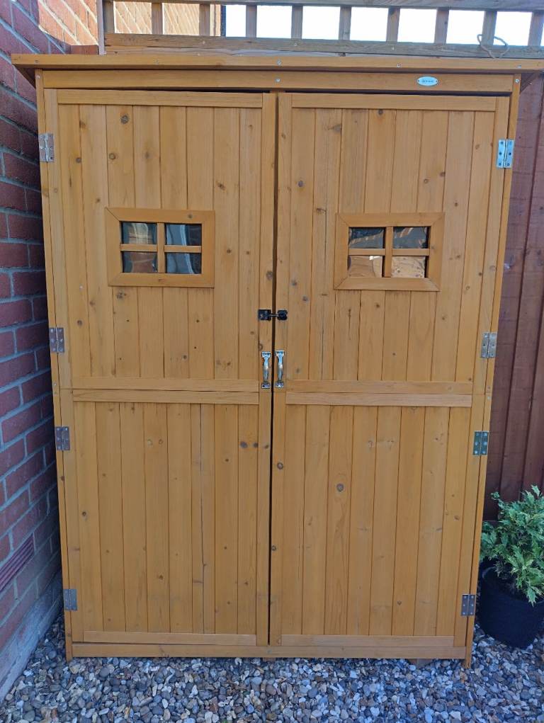 Compact Wooden Outdoor Storage Shed – Good Condition
