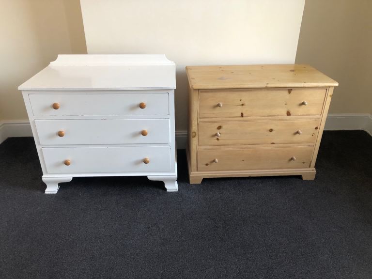 A pair of wooden chests of drawers