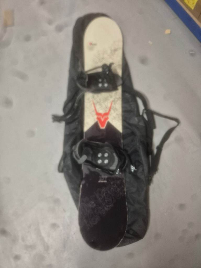 157cm snowboard, bindings and size 10 boots