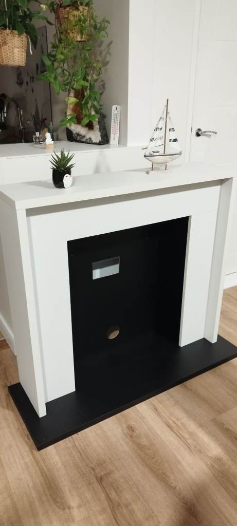 White Fireplace Surround with Black Hearth – Good Condition