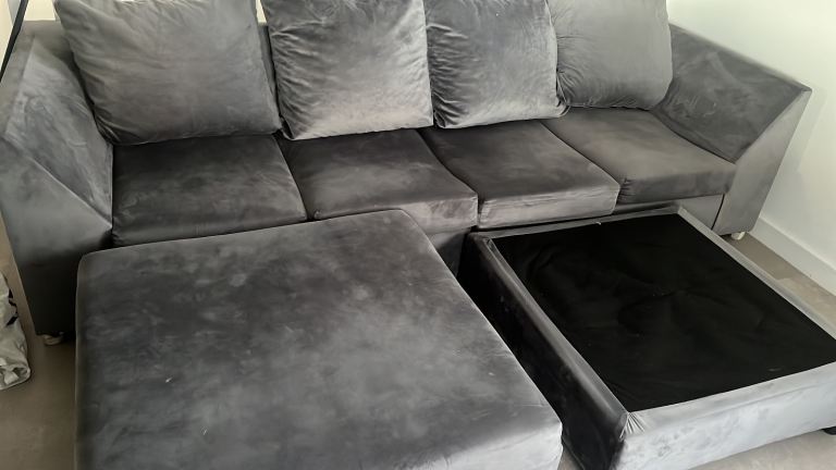 4 seater sofa with 2 foot stools 