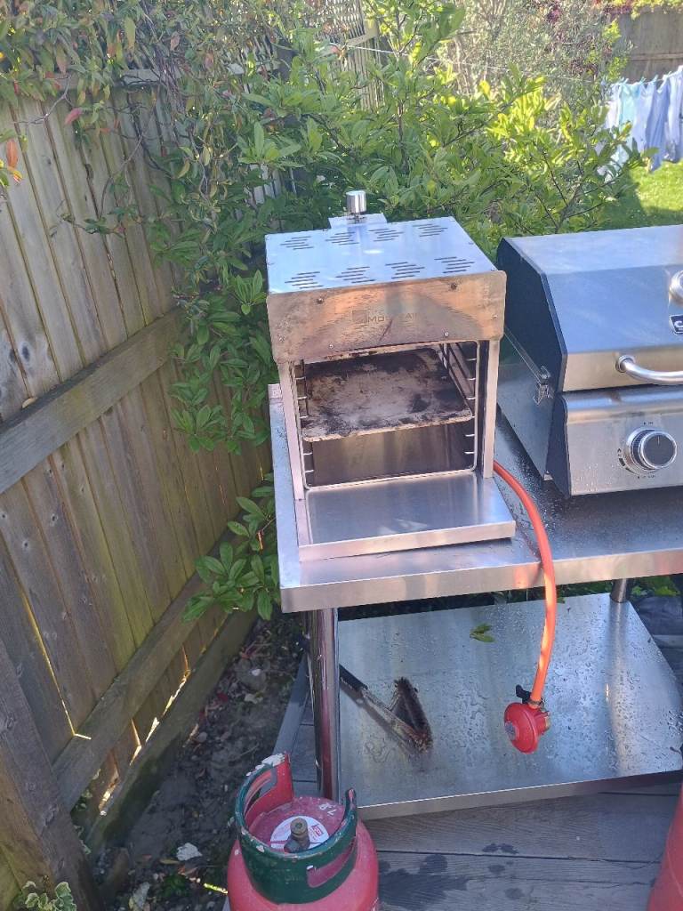Fire mountain gas pizza oven and steak grill