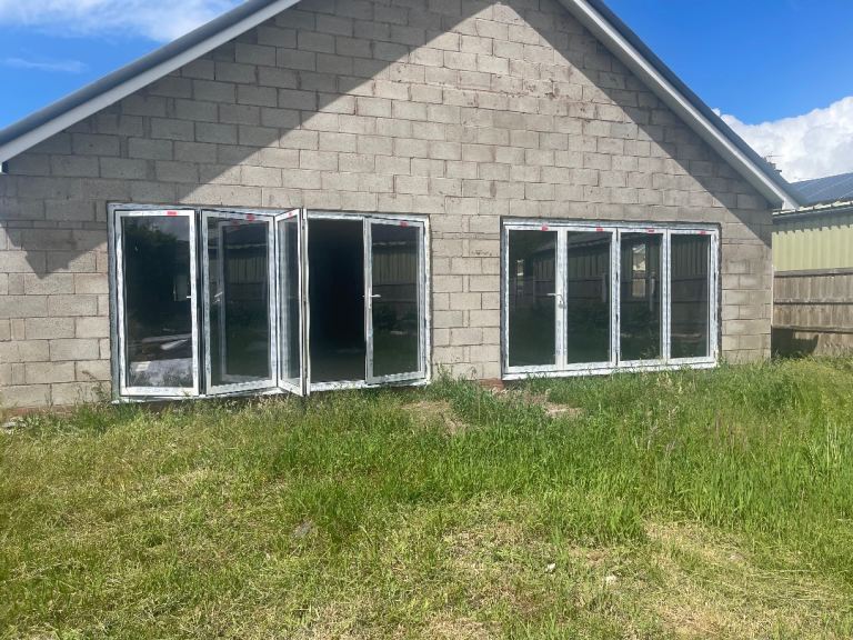 White UPVC Bi-Fold Doors X 2 sets - Double Glazed, Good Condition