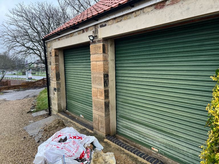 Two Roller Shutter Remote Controlled Garage Doors for sale