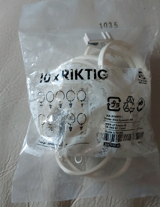 Ikea 10 x white plastic  hooks and clips for handing curtains