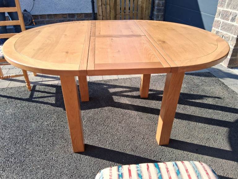....SOLD....solid round Morris dining table with chairs