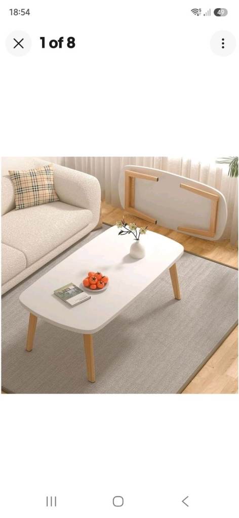 Brand New White Coffee Table with Light Wooden Legs
